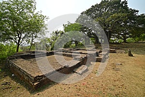 View of excavated structures at Ratnagiri Buddhist archaeological site, Odisha, India.