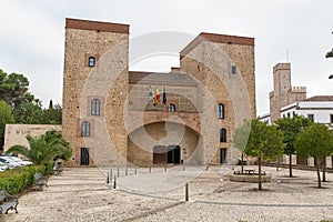 View at the exterior front facade at the iconic building at the Roca Dukes Palace, Palacio de los Duques de la Roca, currently photo