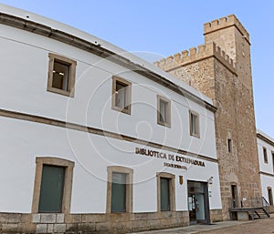 View at the exterior front facade at the public library, Biblioteca de Extremadura, on Plazuela de Ibn Marwan, inside the citadel photo