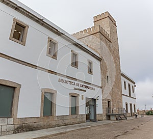 View at the exterior front facade at the public library, Biblioteca de Extremadura, on Plazuela de Ibn Marwan, inside the citadel photo