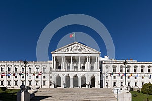 View of the facade of the Assembleia da Republica Portuguese Parliament, with the european union countries flags raised in order