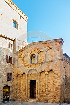 View at facade of church of San Bartolo in the streets of San Gimignano in Italy,Tuscany