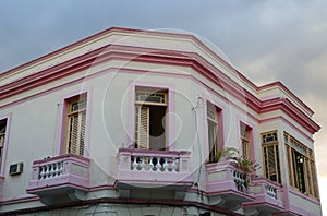 View of the facade with terrace of a building in Santiago de Cuba