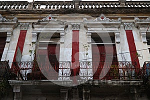 View of the facade with terrace of a building in Santiago de Cuba