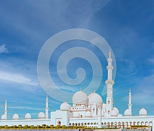 View of famous Abu Dhabi Sheikh Zayed Mosque by night, UAE.