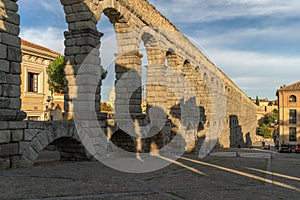 View of the famous Aqueduct of Segovia in Spain photo