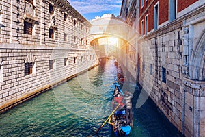 View of the famous Bridge of Sighs in Venice, Italy. Traditional Gondola and the famous Bridge of Sighs in Venice, Italy. Gondolas