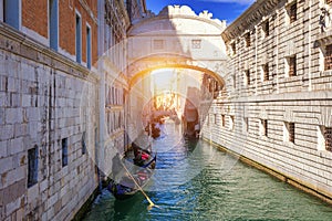View of the famous Bridge of Sighs in Venice, Italy. Traditional Gondola and the famous Bridge of Sighs in Venice, Italy. Gondolas