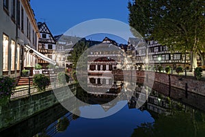View of famous canal in little France district by night, Strasbourg, France