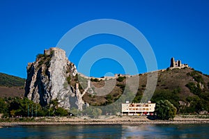 View of the famous Devin Castle on a hill  in Bratislava, Slovakia under a clear blue sky background