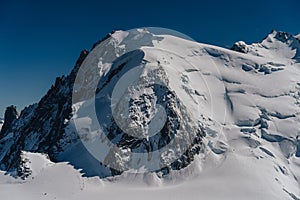 View of famous Mont Blanc du Tacul from Aiguille Midi.