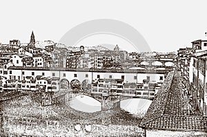 View of the famous Ponte Vecchio bridge over the Arno River in the city of Florence, Tuscany, Italy