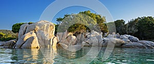 View of famous rock at Santa Giulia beach