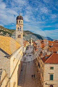 View of the famous Stradun street in the old town of Dubrovnik, as seen from above while climbing the city walls. Long narrow