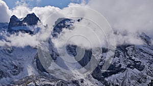View of the famous three towers rock formations in the rugged snow-covered alpine mountains in Montafon, Alps, Austria.