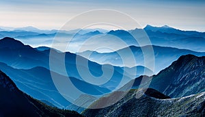 View of far away blue mountains in the fog photo
