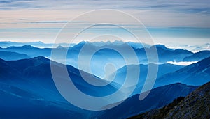 View of far away blue mountains in the fog photo