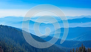 View of far away blue mountains in the fog photo