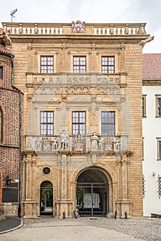 View at the Fascade of castle in the streets of Brzeg in Poland