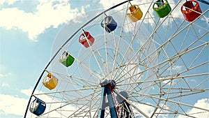 View of a ferris wheel over blue sky
