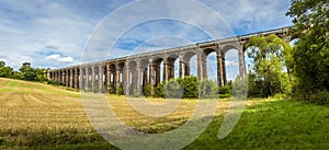 A view from a field looking northward towards the Ouse Valley viaduct in Sussex, UK