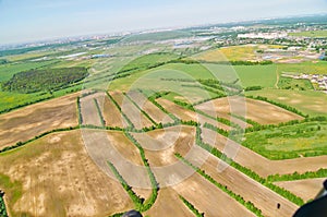View of fields and meadows from height of bird's flight