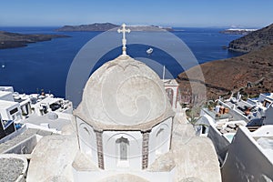 The view on Fira town and the Orthodox Church of St. John, Santorini,