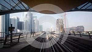 View from first railway carriage. Dubai city metro