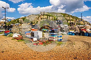 The view of fishing nets and vessels moored on the beach at Hastings, Sussex, UK