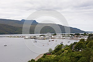 View of the fishing port and the village of Ullapool in the Highlands in Scotland, United Kingdom