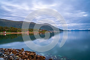 View of the fjord from Tromso on the island of Tromsoya at dusk