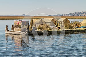 View of floating island Uros, Lake Titicaca, Peru, Bolivia photo