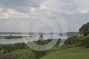 View of the floodplain of the river with a stormy sky Oka river Russia