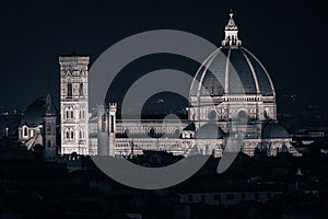 View of Florence Cathedral in Italy from a distance, illuminated in dark and somber tones