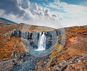 View from flying drone of Gufufoss Gufu Waterfall.