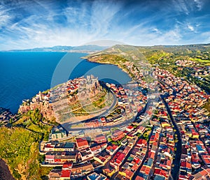 View from flying drone. Impressive summer cityscape of Castelsardo port. Aerial view of Sardinia island, Province of Sassari, Ital