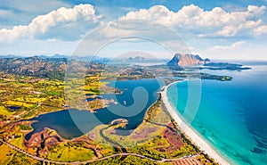 View from flying drone. Incredible spring view of La Cinta beach. Aerial morning scene of Sardinia island, Italy, Europe. Sunny Me