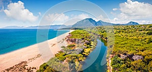 View from flying drone. Picturesque morning view of Osala Beach. Sunny summr scene of Sardinia island, Italy, Europe. Beautiful se