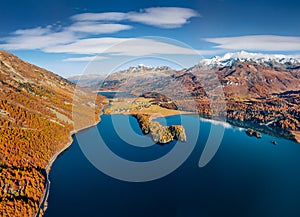 View from flying drone of Sils lake. Fabulous autumn scene of Swiss Alps.