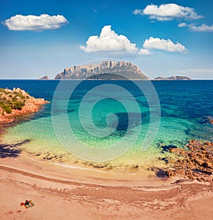 View from flying drone. Warm summer day on Spiaggia del dottore beach. Sunny morning scene of Sardinia island, Italy, Europe. Exot