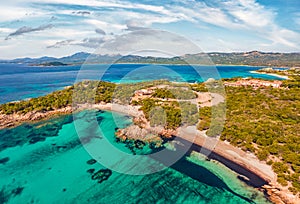 View from flying drone. Wonderful morning scene of popular touris deastination - Capriccioli beach, Costa Smeralda. Aerial summer photo