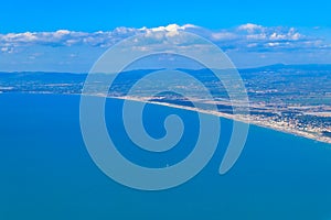 View from a flying plane on Fiumicino bay and the Tyrrhenian sea, Italy