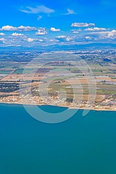 View from a flying plane on Fiumicino bay and the Tyrrhenian sea, Italy