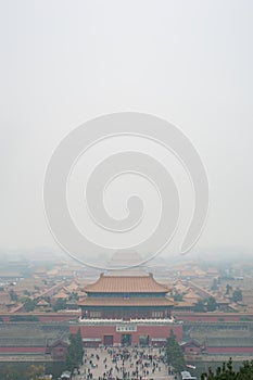 View of the Forbidden City through the air pollution, Beijing. Taken from the top of the hill in Jingshan Park.