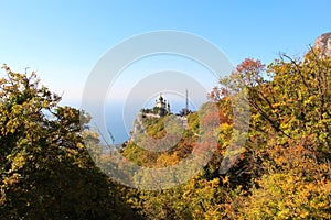 View of Foros Church through the autumn forest