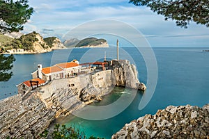 Fortified rocky cliff in Petrovac, Montenegro photo