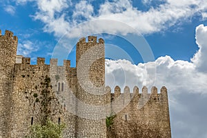 View of the fortress and Luso Roman castle of Ã“bidos, with buildings of Portuguese vernacular architecture and s
