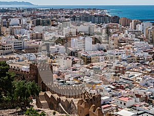 View from the fortress of Moorish houses and buildings along the port of Almeria, Andalusia, Spain