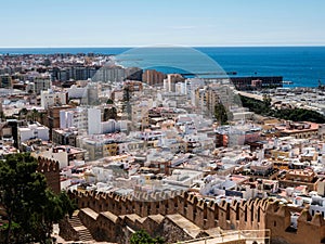 View from the fortress of Moorish houses and buildings along the port of Almeria, Spain