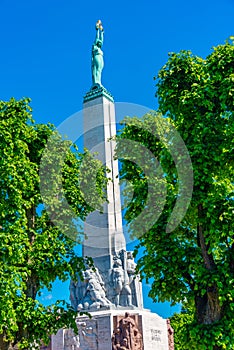 View of the Freedom monument from the Bastelkajna park in Riga,